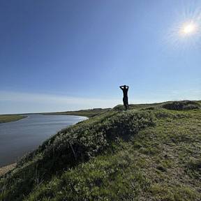Taylor on the bank of the Meade river